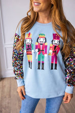 Load image into Gallery viewer, Nutcrackers on Blue Top with Sequin Sleeves
